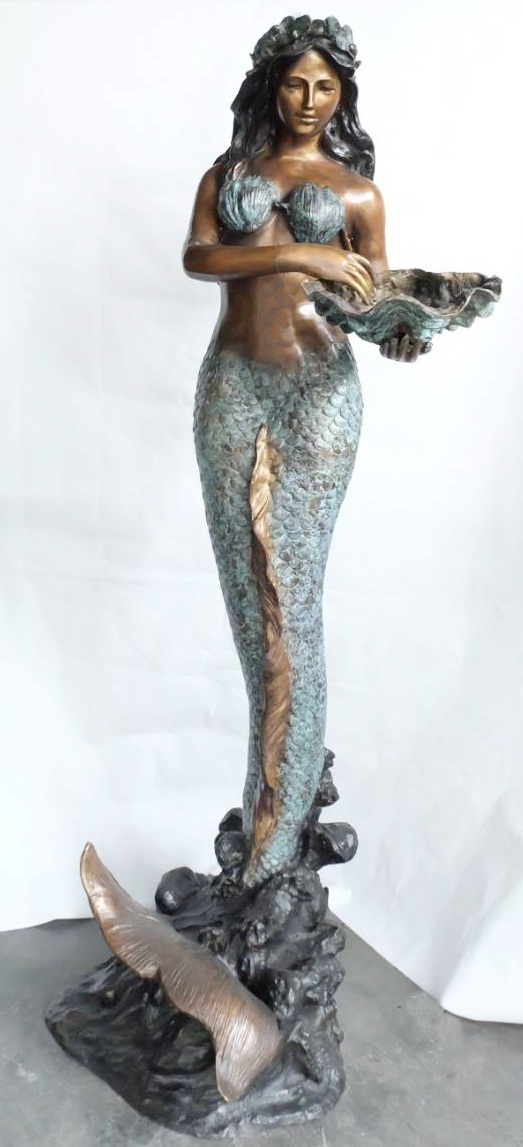 Mermaid holding shell
